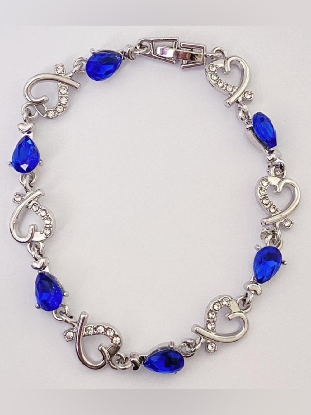 Silver Heart Link Bracelet with Sapphire Blue Teardrop Stones